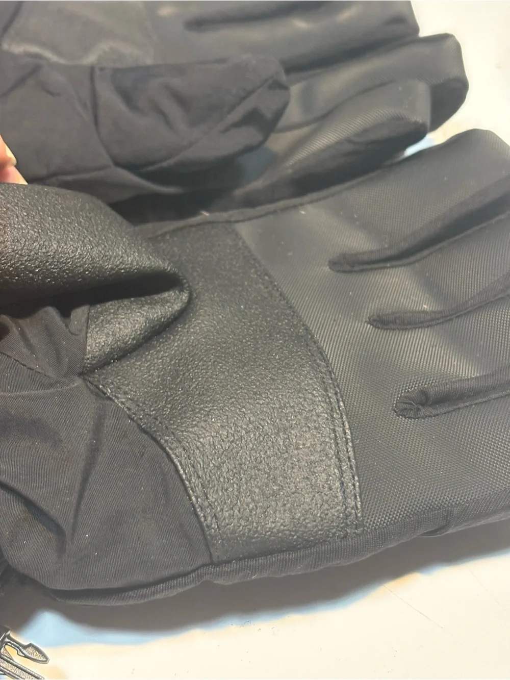 black SCOTT gloves feature insulated thermal barriers cold weather protection